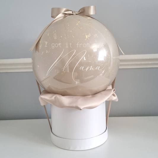 Netural glossy bubble balloon hat boxes with gold flakes. finished off with satin fabric and ribbon. Personalised with your choice of wording.